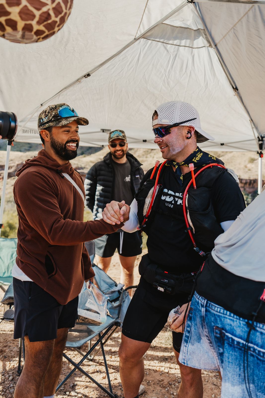 Handshake at an aid station